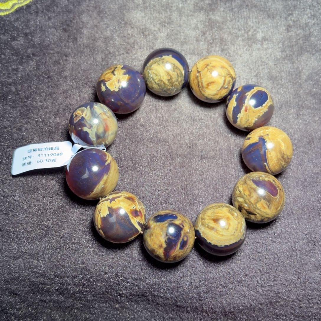 琥珀未镶嵌珠宝奇石21mm油根蜡黑加仑妖花溶洞