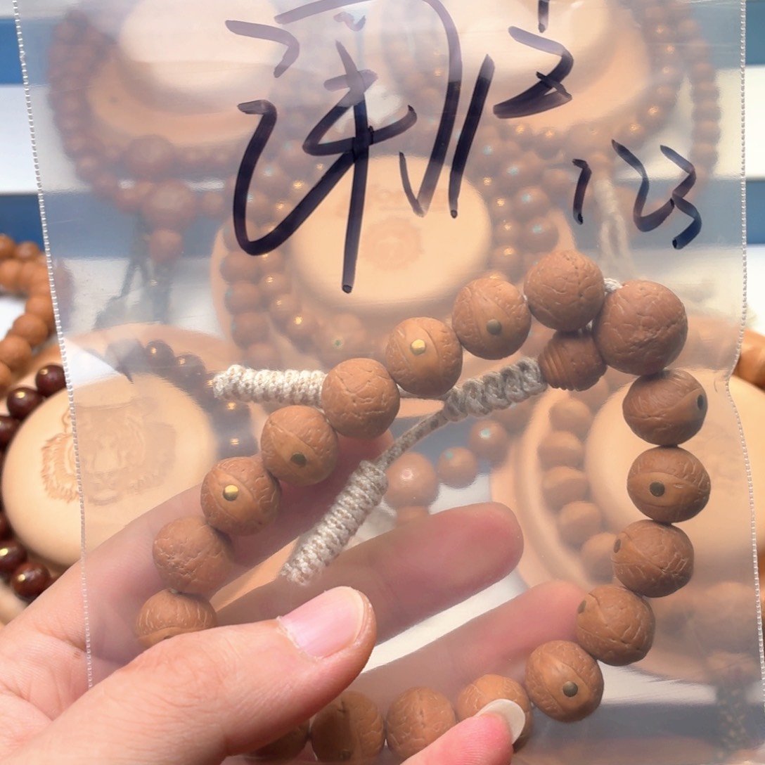 用***7凤眼菩提手串镶嵌