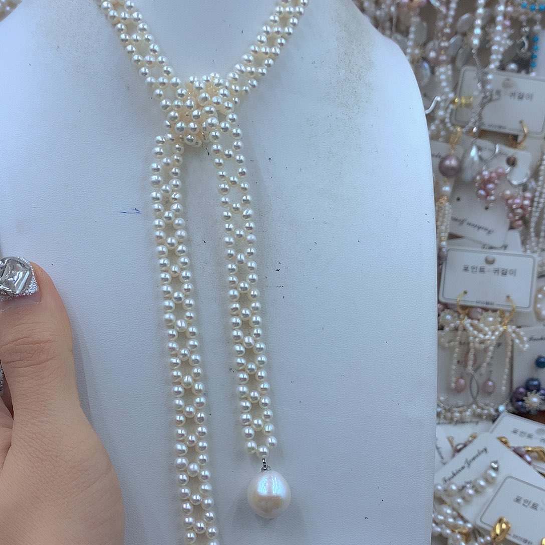 哆***多淡水珍珠银S925镶嵌耳饰