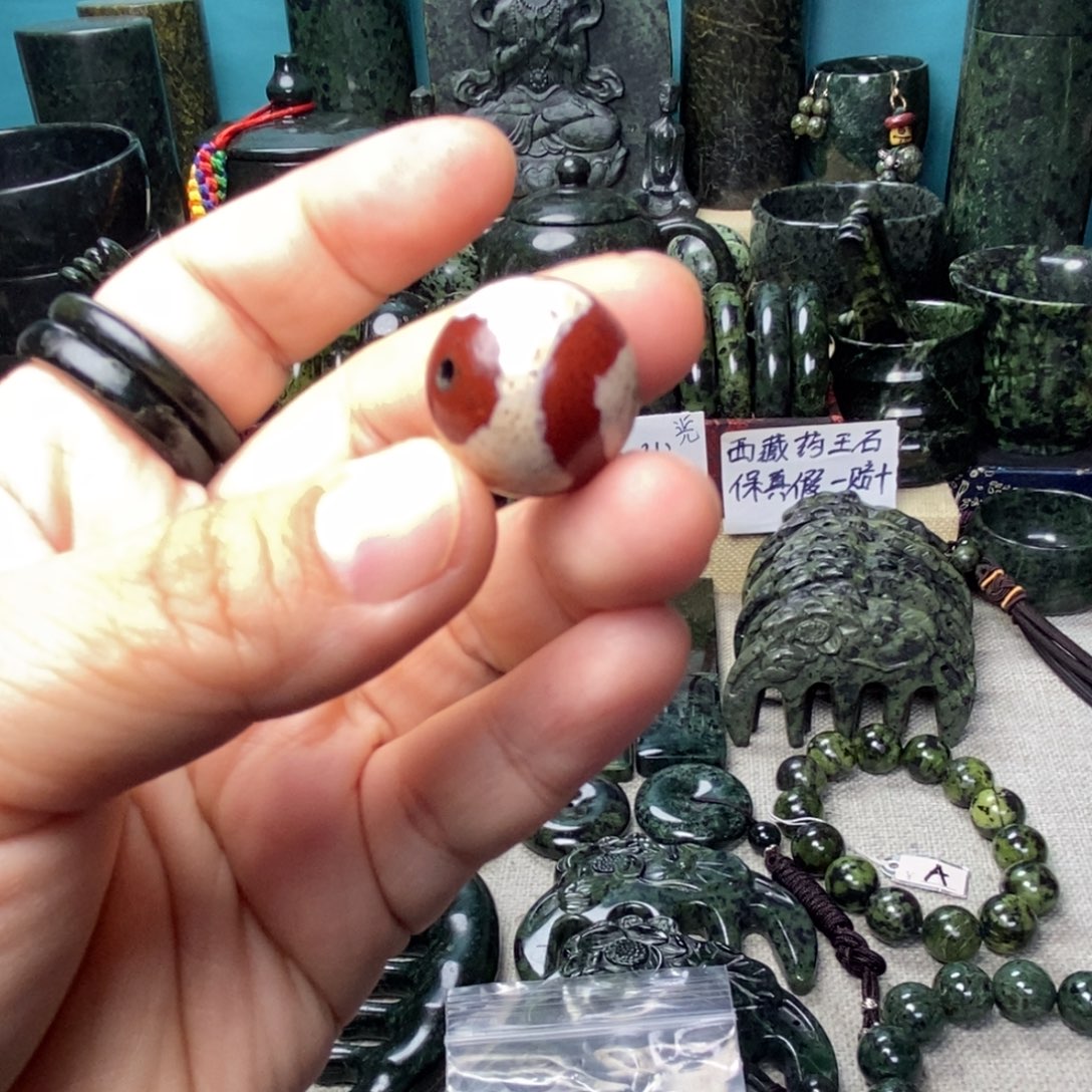 就****蛇纹石玉未镶嵌虎牙