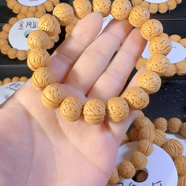 宇***哥桃核吊坠金丹桃核