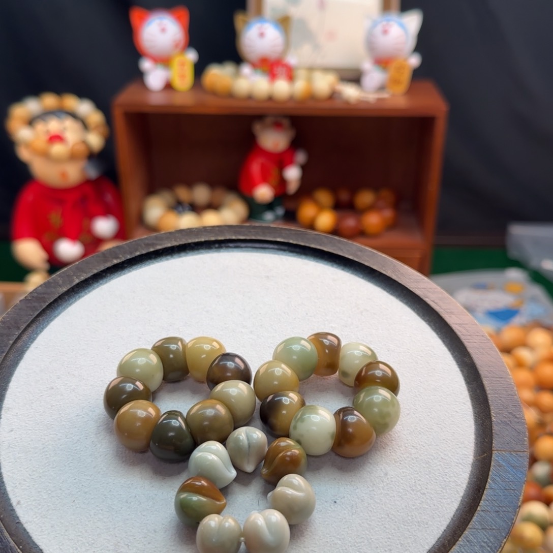 菩提根/象牙果手串卡15蒜瓣手捻瑕疵。 三个