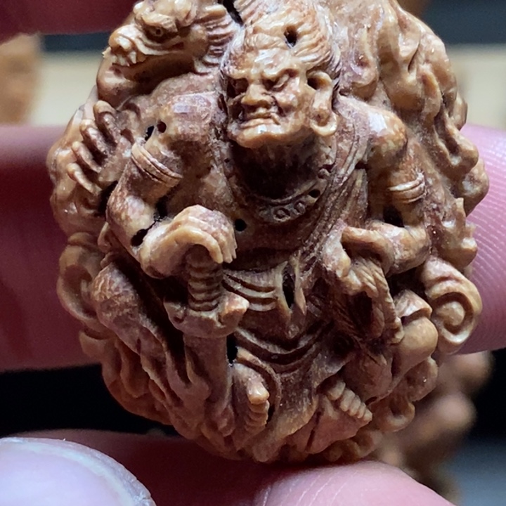 茶****核桃把件风味纯手工桃核雕刻不动明王