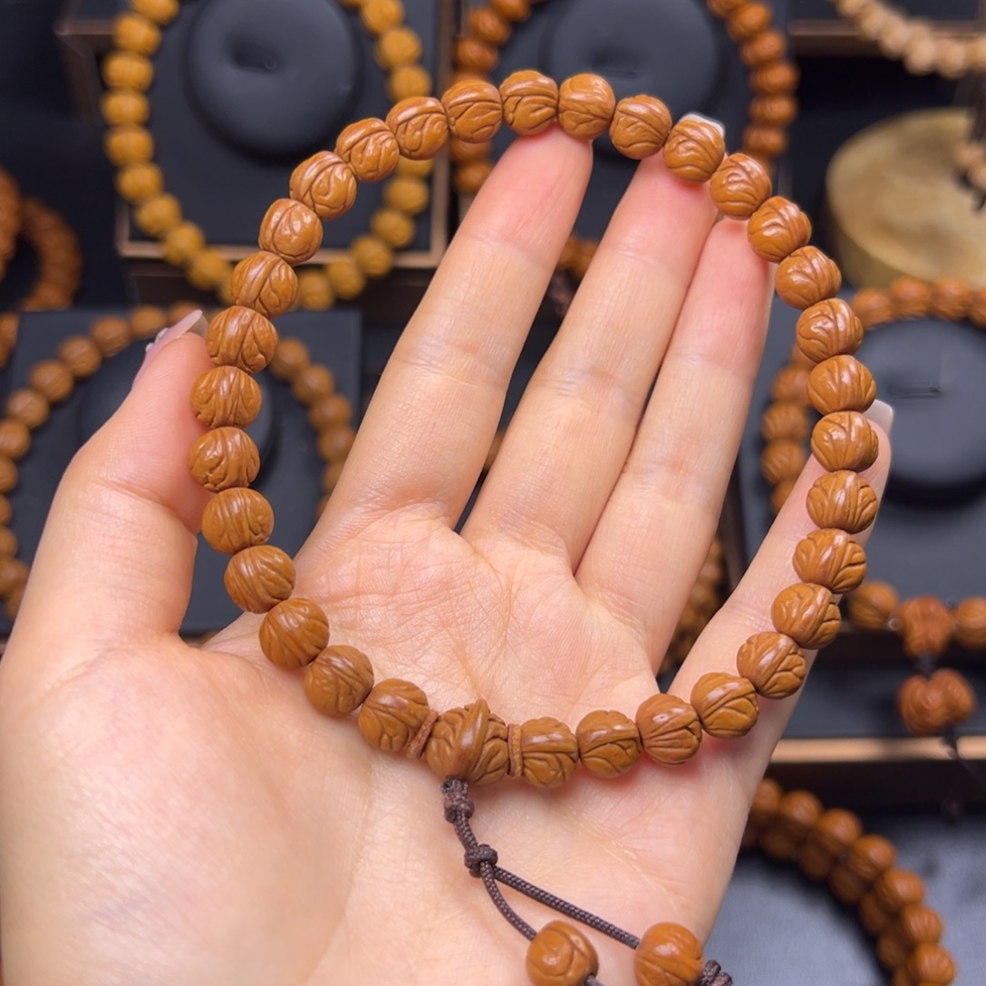 悟***洞手串桃核野生玉龙脊0.9