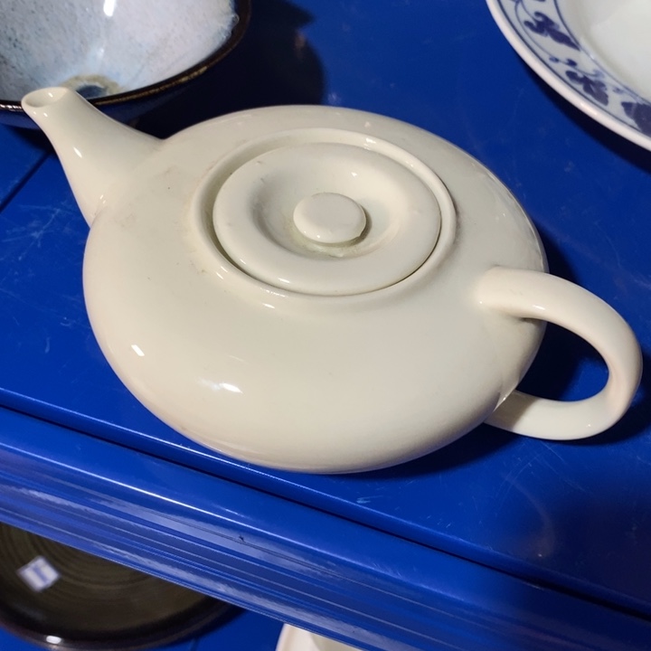 瓷片象牙瓷手把壶约200ml