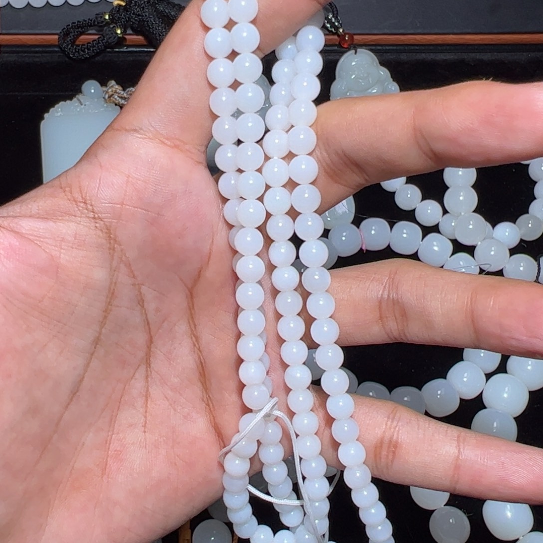 罗***珠和田玉未镶嵌手链