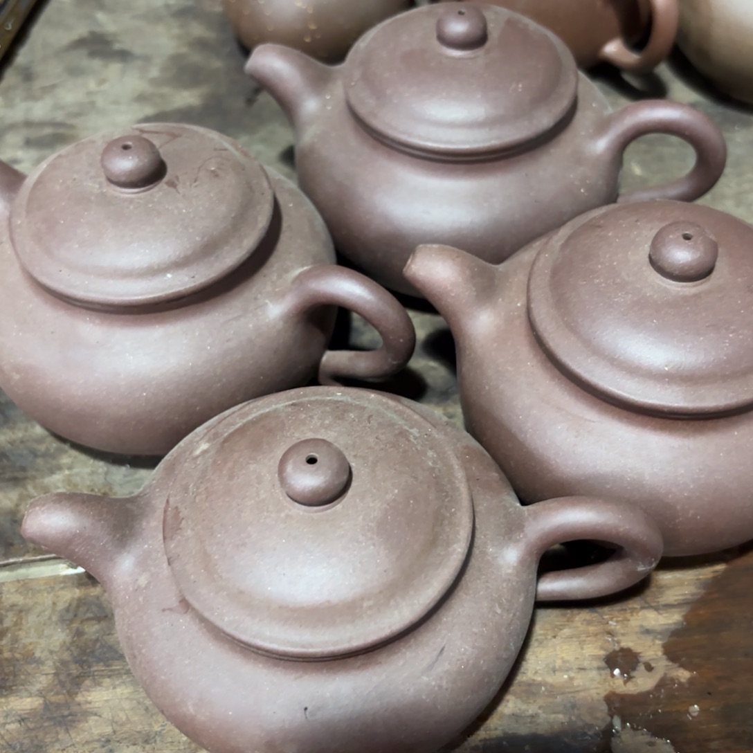 紫砂茶壶紫砂和花木也可以在一定条件里种植