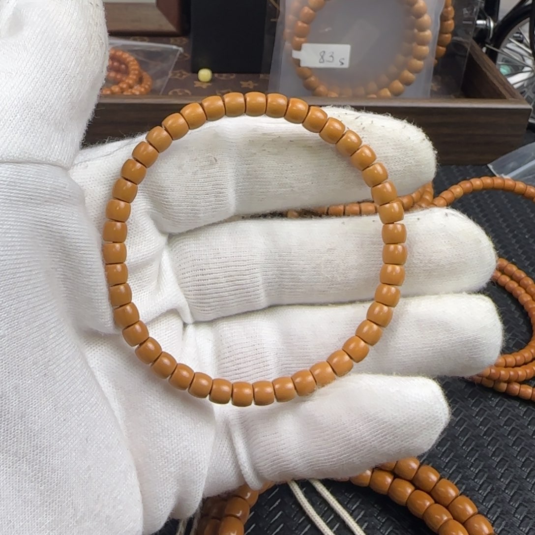 橄榄核吊坠奋****后5.6mm老挝核尖直切单圈