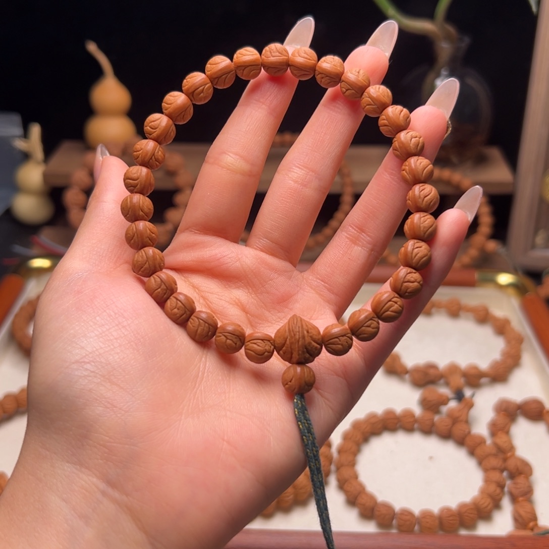 杨***营木质类陕西龙纹桃核9.0