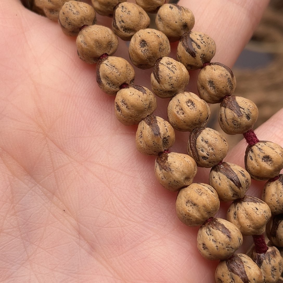 奔***a把件柏香籽/百香籽