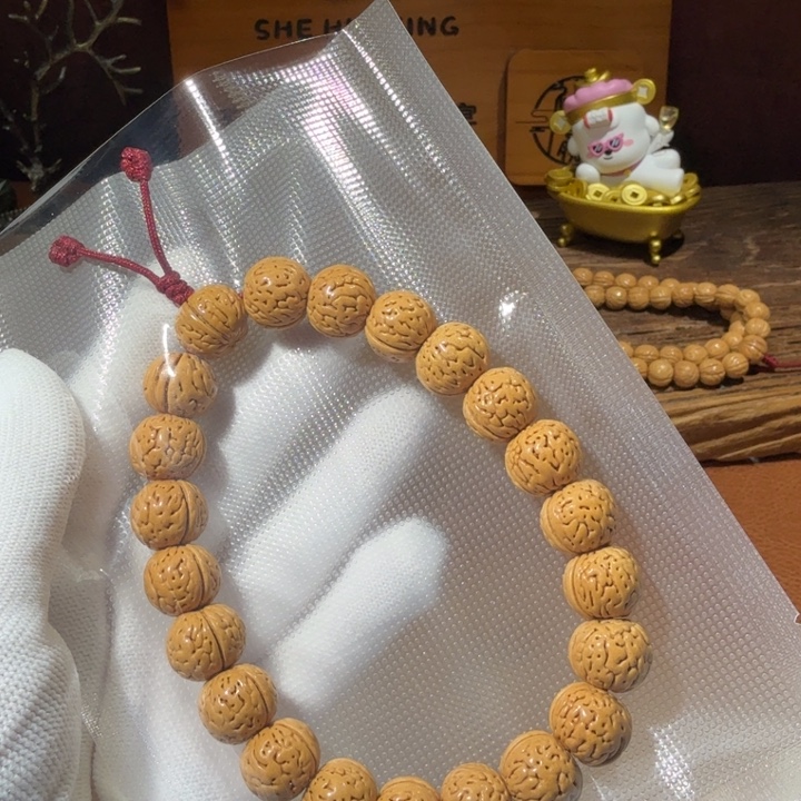 墨***尘桃核吊坠1.5黄桃苹果