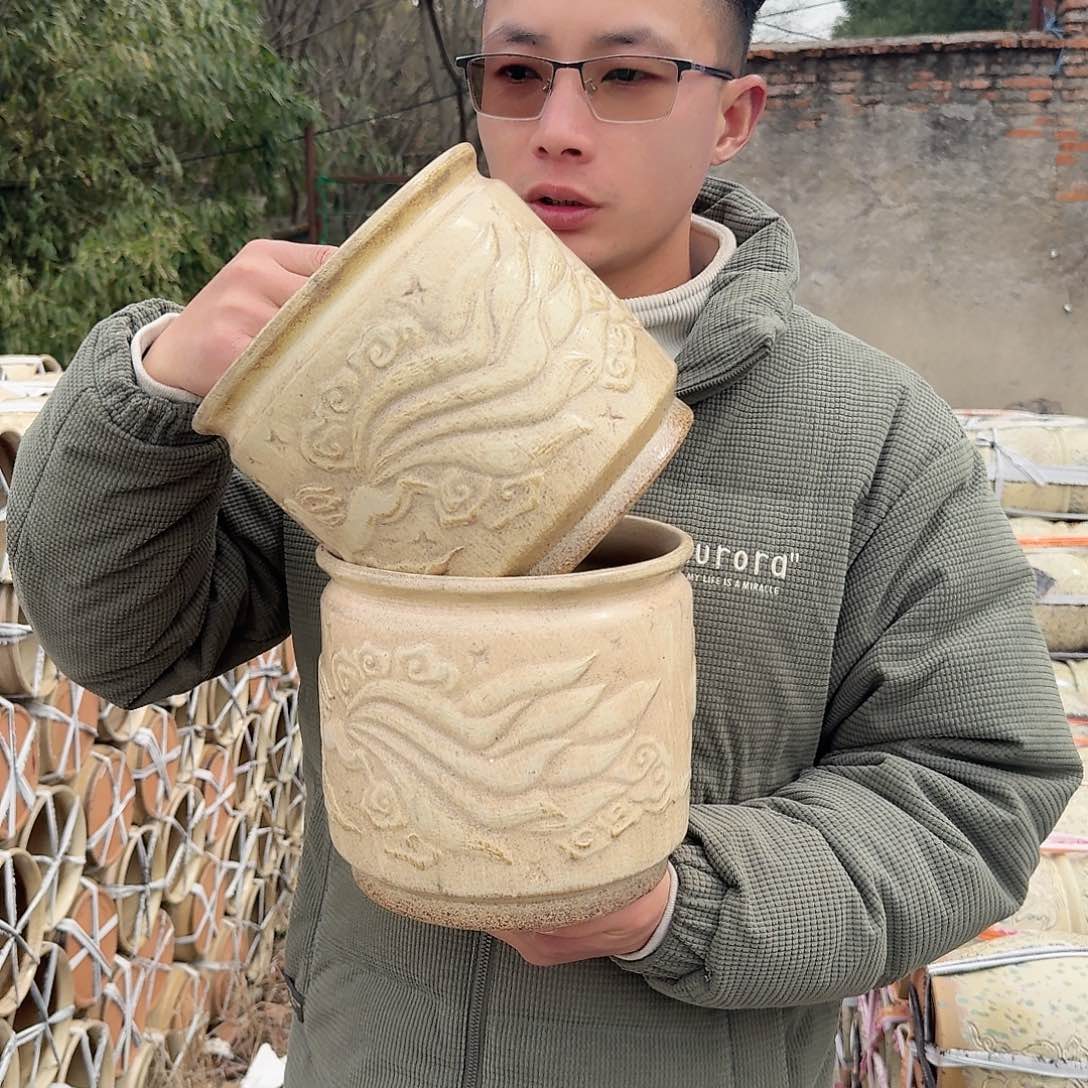 紫砂花盆口20高19（两个九尾狐柴烧