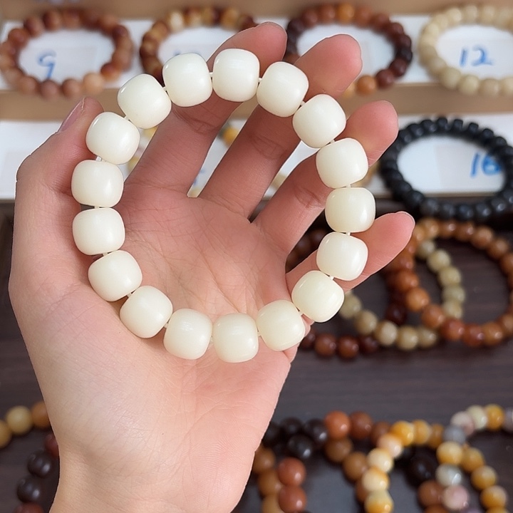 茉***.菩提根/象牙果手串卡14干磨桶珠大白兔