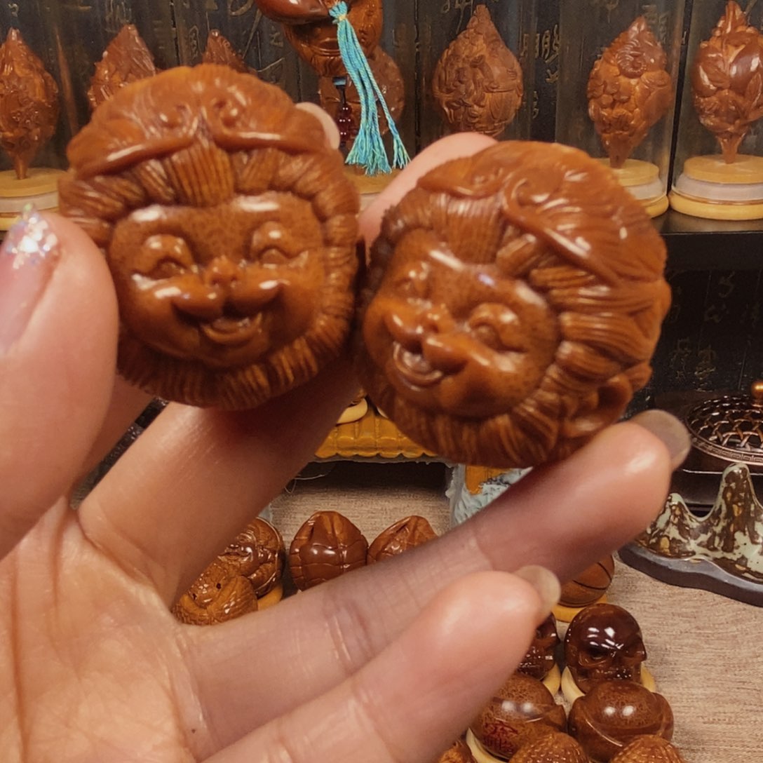 橄榄核吊坠别****笑笑猴一对0088