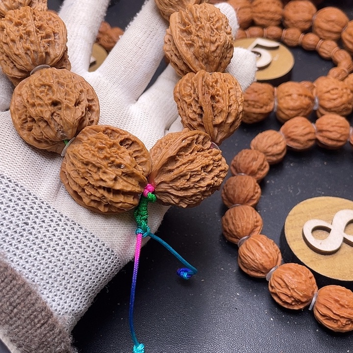 爱***。文玩核桃把件野生嘛核