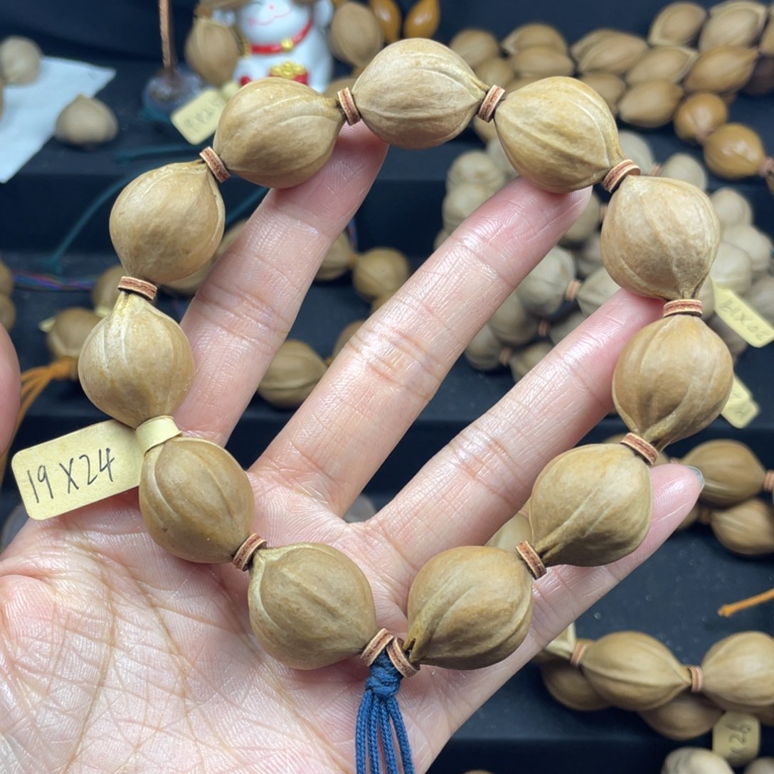 002橄榄核三花19*24
