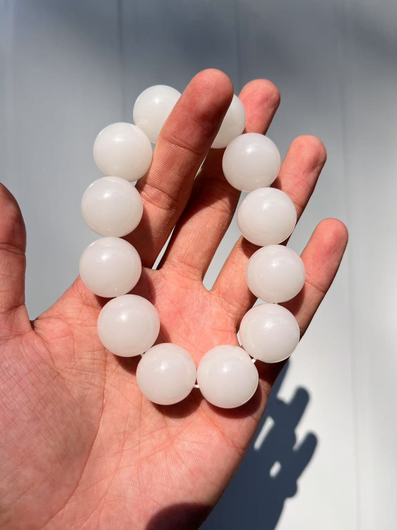 黑山羊脂白正圆款手串卡20mm     L027