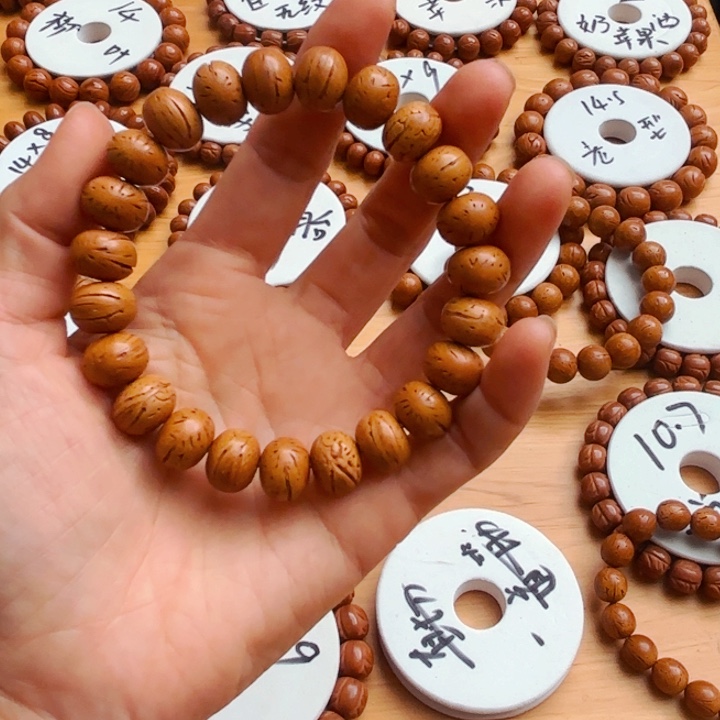 谭****心东北脑纹桃核12尺算盘