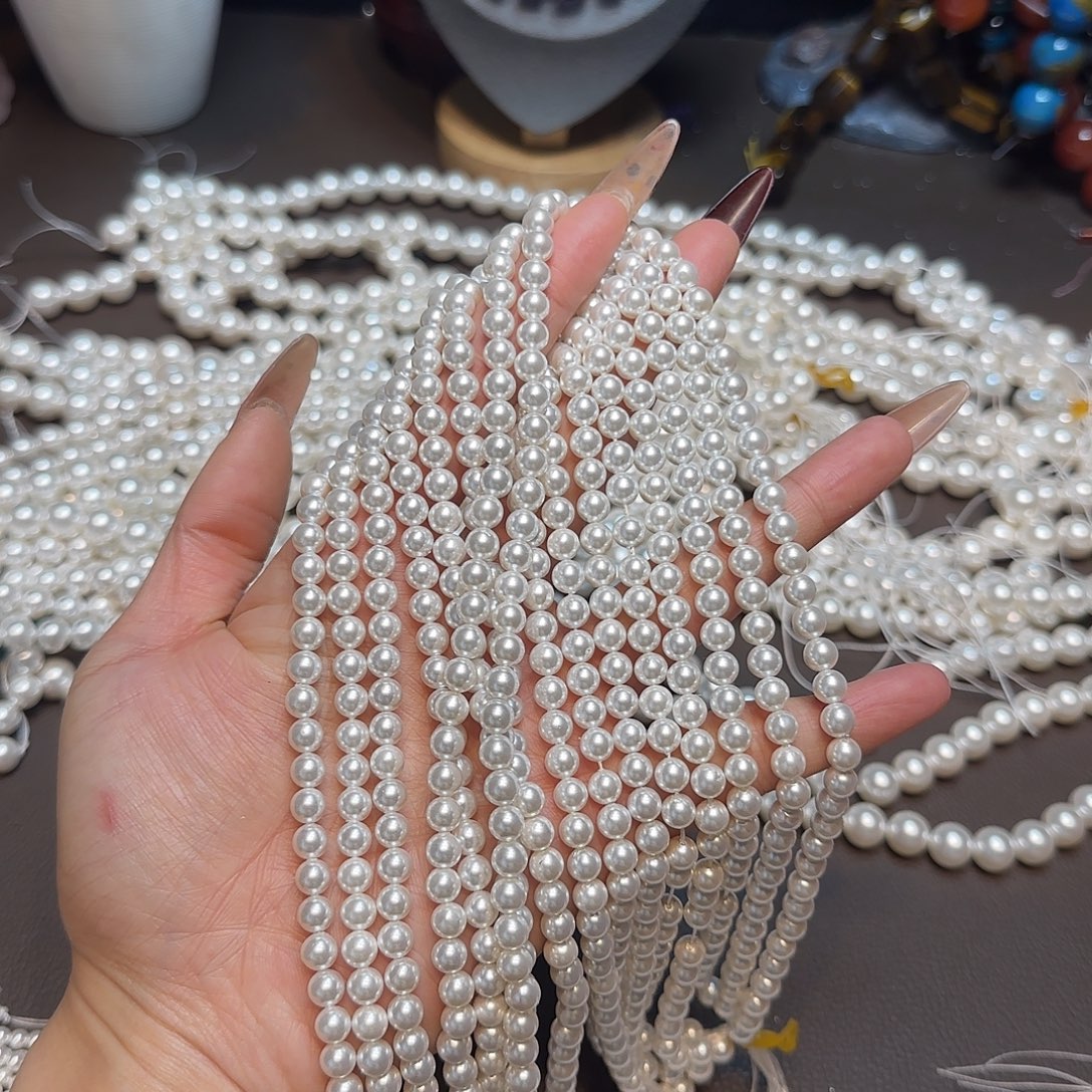 玛瑙/玉髓未镶嵌珠宝半成品天然深水贝珠6mm一条