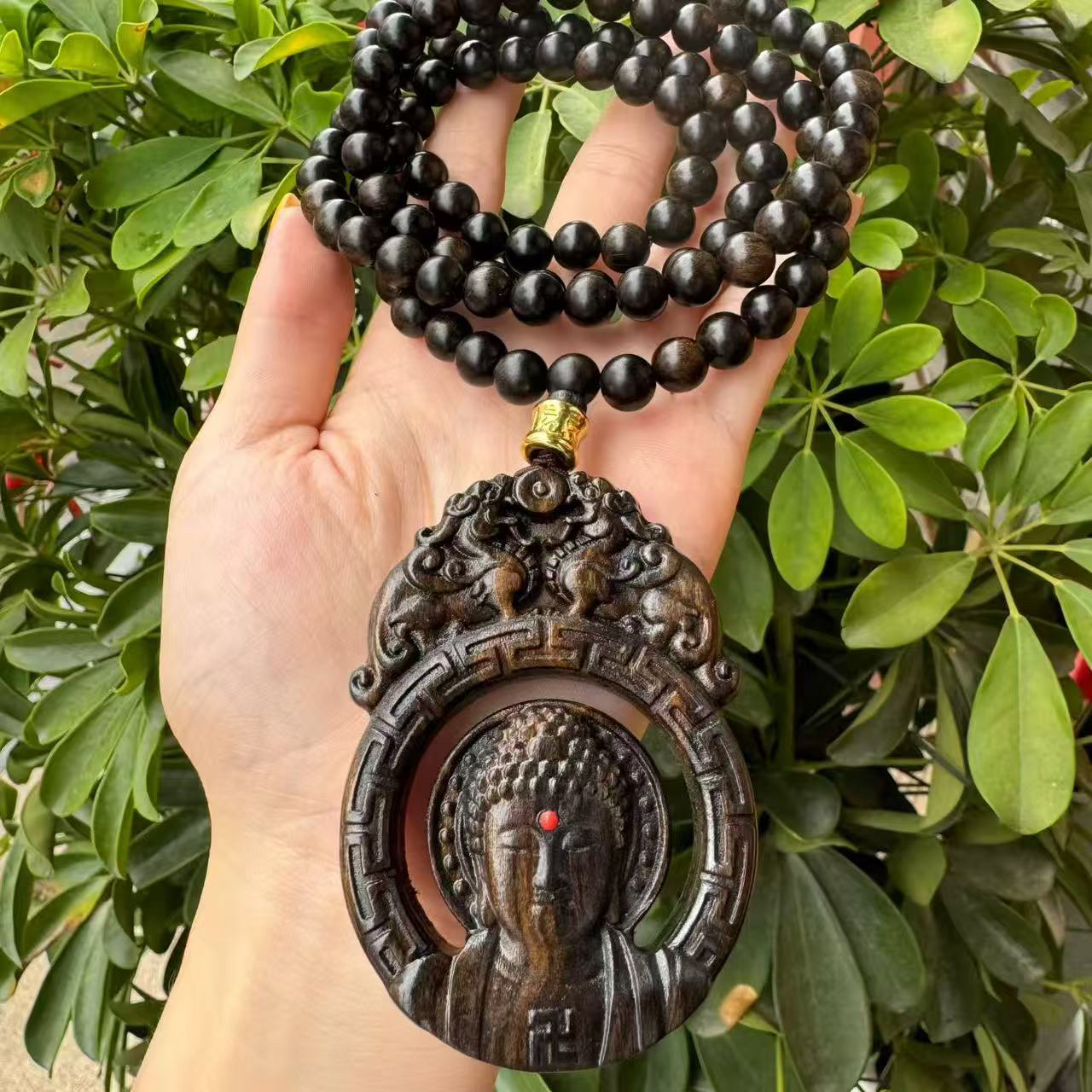 增香沉香木镂空佛头镶嵌罗盘/赠送108珠子一条原木双面精工雕刻