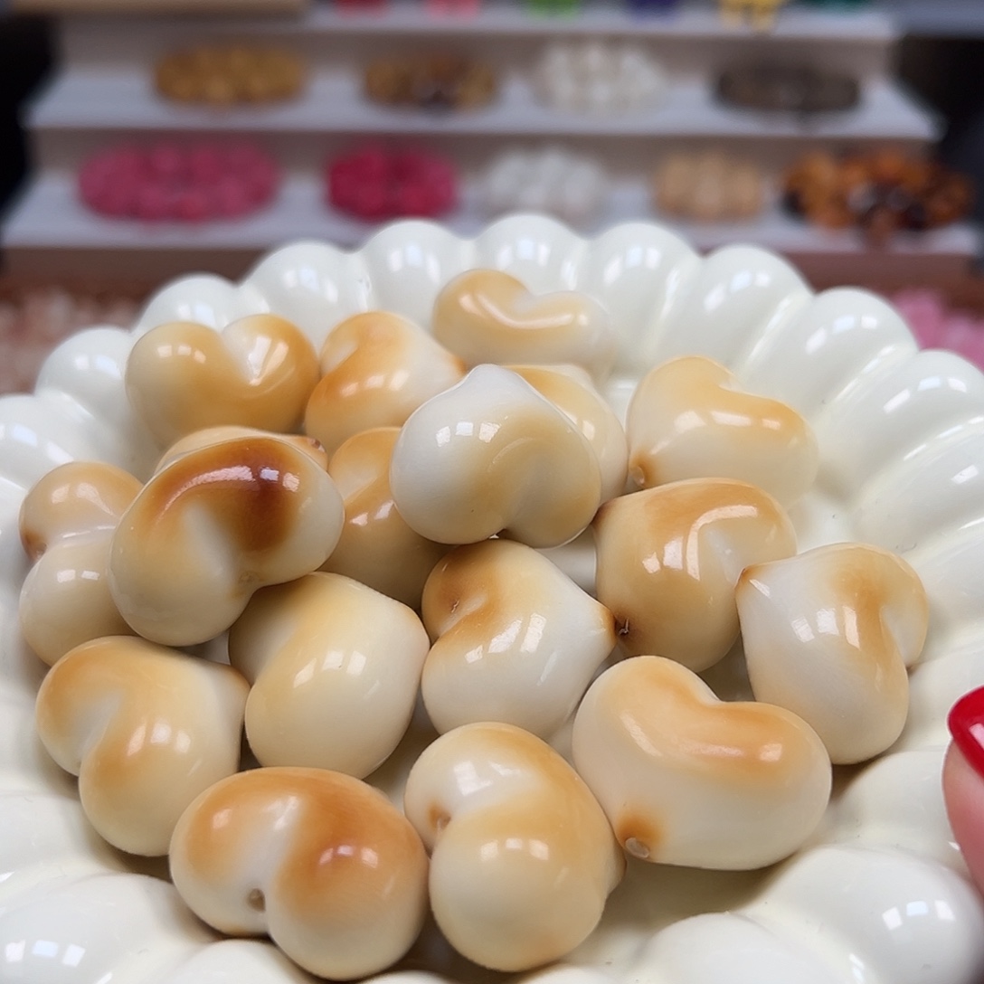 手串菩提根/象牙果瑕疵炭烤皮桃爱心4颗