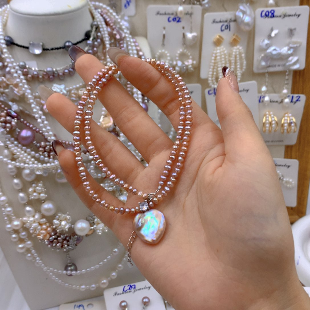 淡水珍珠耳饰银S925镶嵌小***?