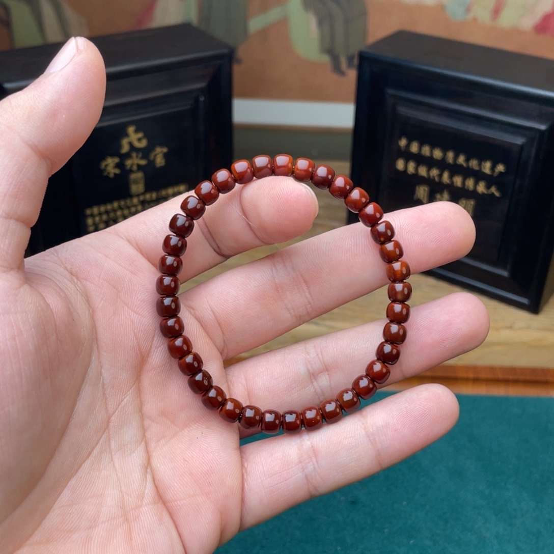 橄榄核手串核尖表弟回血