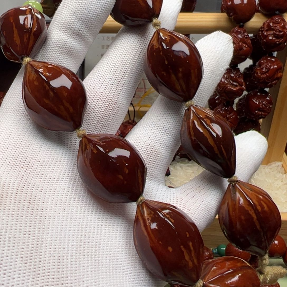 【闪购商品】橄榄核吊坠。**，864579977899