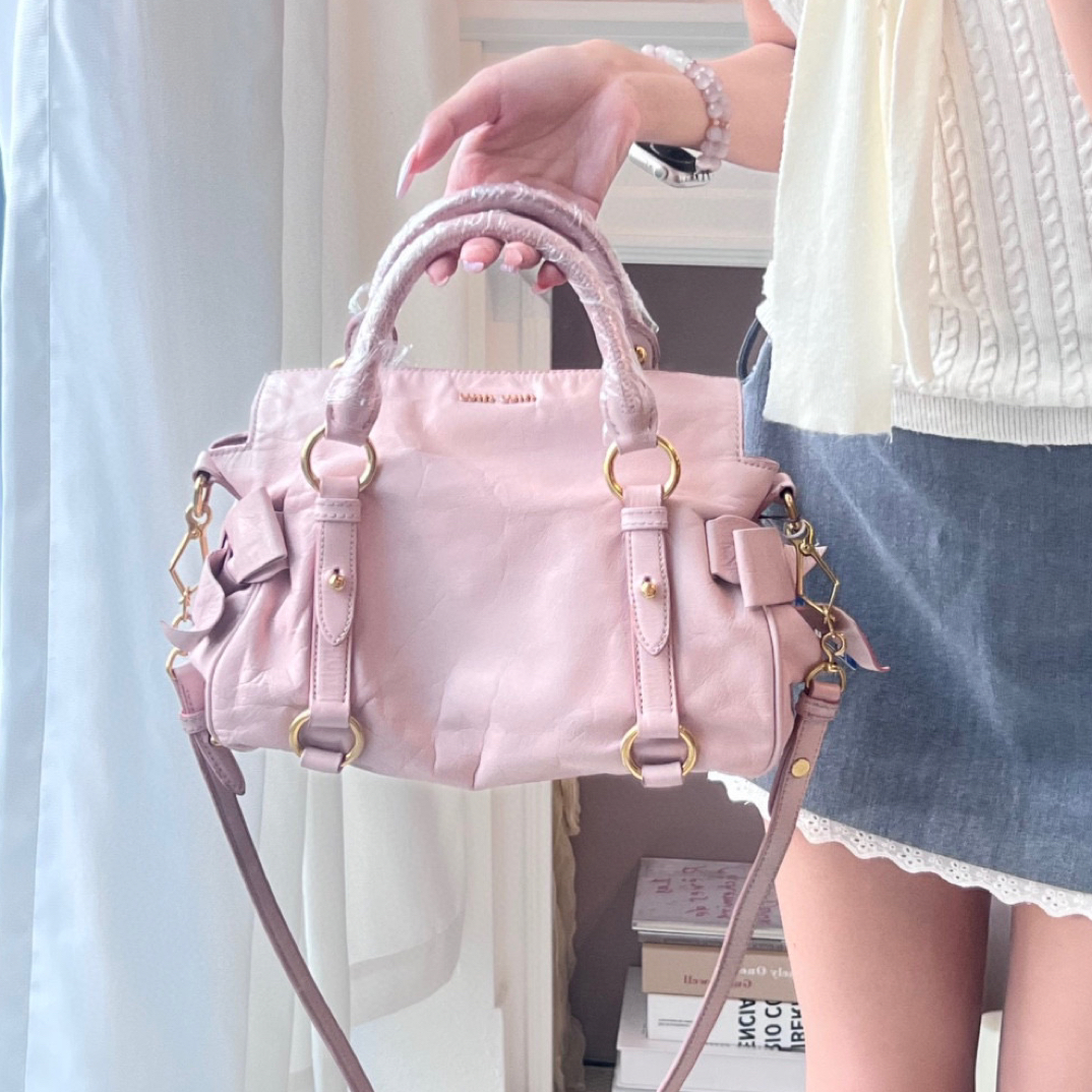 95新 MIU MIU/缪缪 miumiu浅粉色蝴蝶结机车包