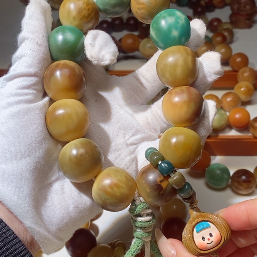 【闪购商品】菩提根/象牙果吊坠24mm瑕手持