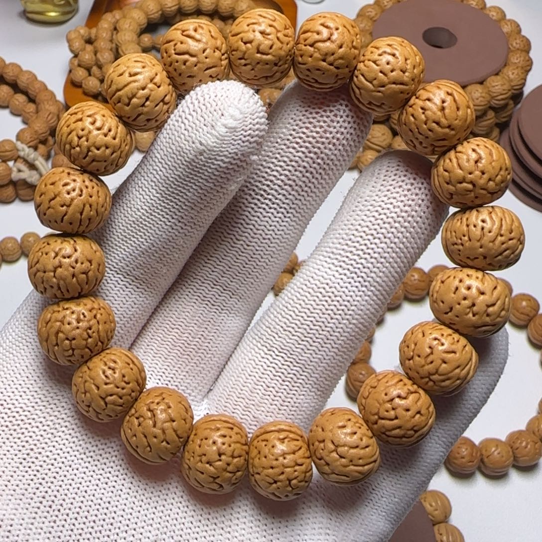 阿***彬手串桃核15金丹宽齐