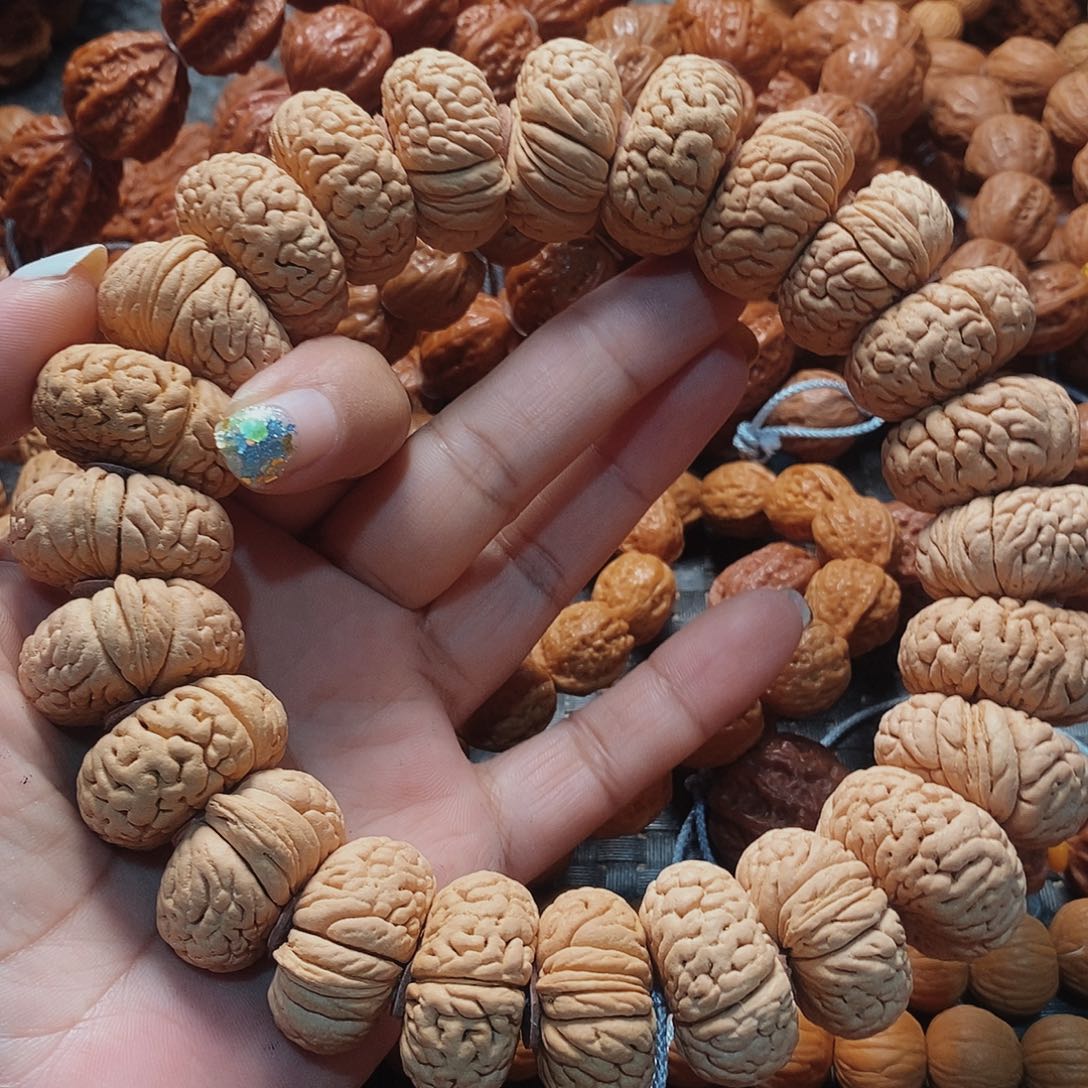 粕***粿文玩核桃手串桃核夹板