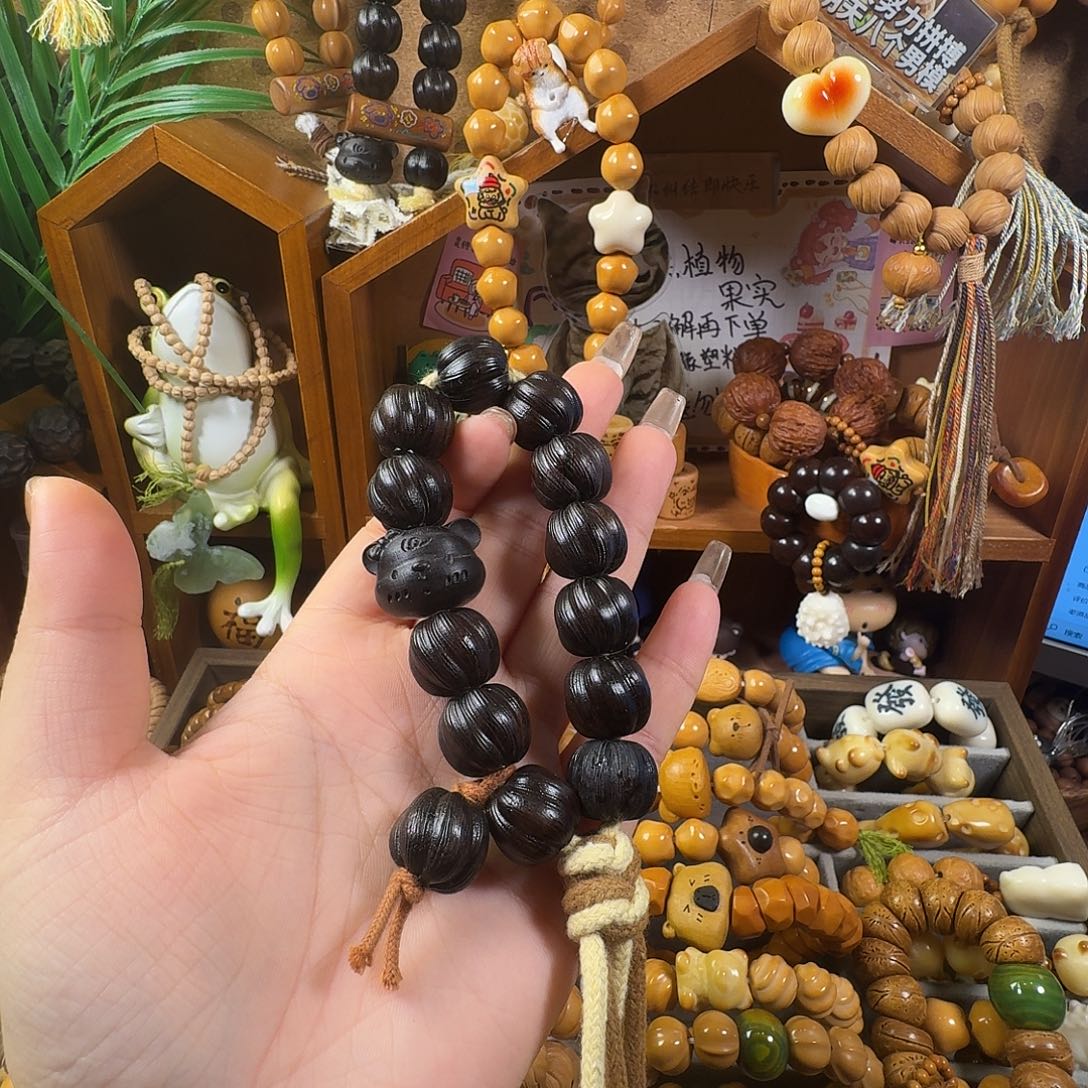 吊坠桃核黑松露手持