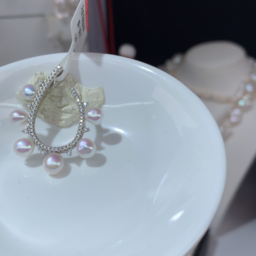 暖***的淡水珍珠吊坠银S925镶嵌