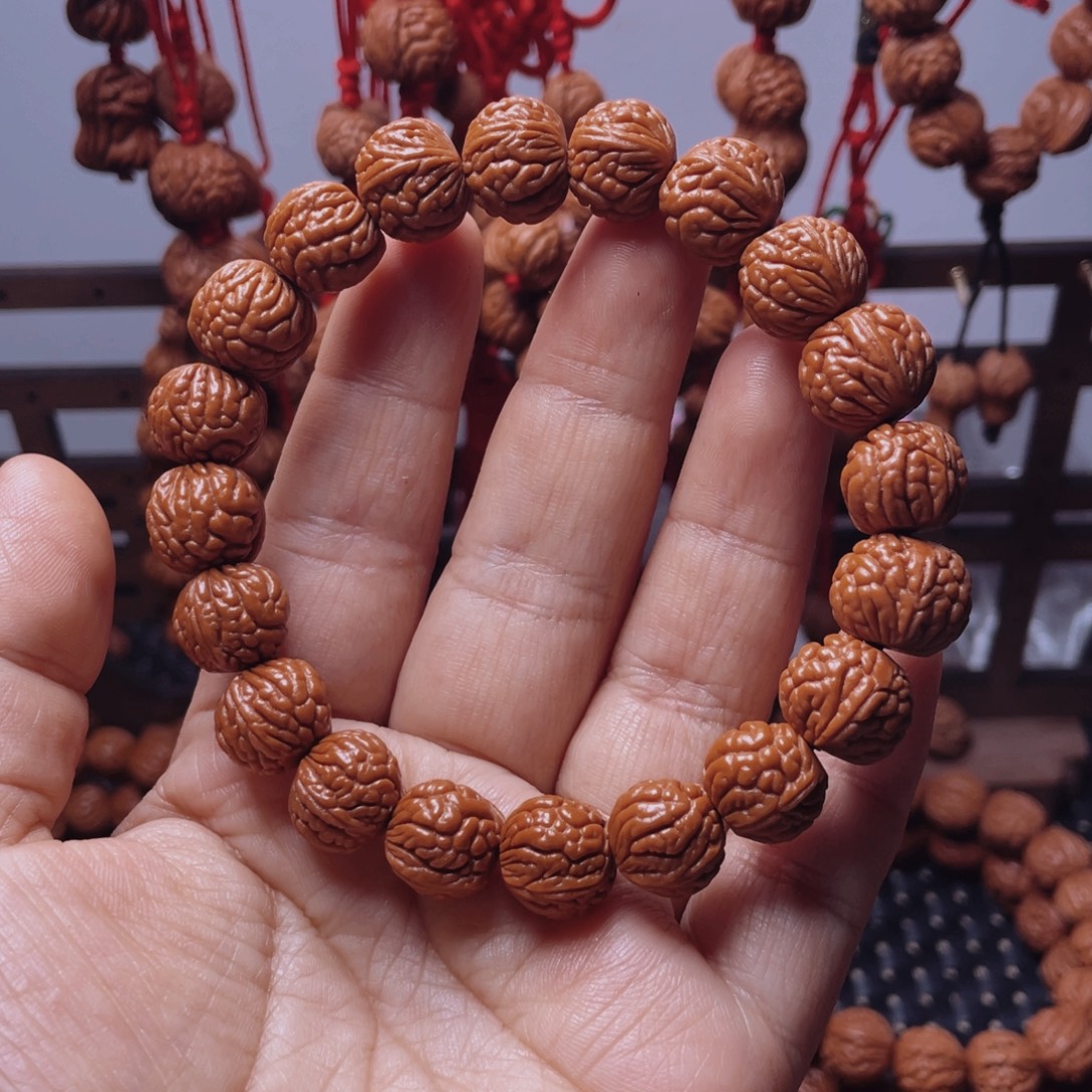 木质类龙纹桃枭手串