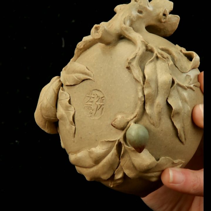 茶壶紫砂全手工制作的话，全手工制作的话，全