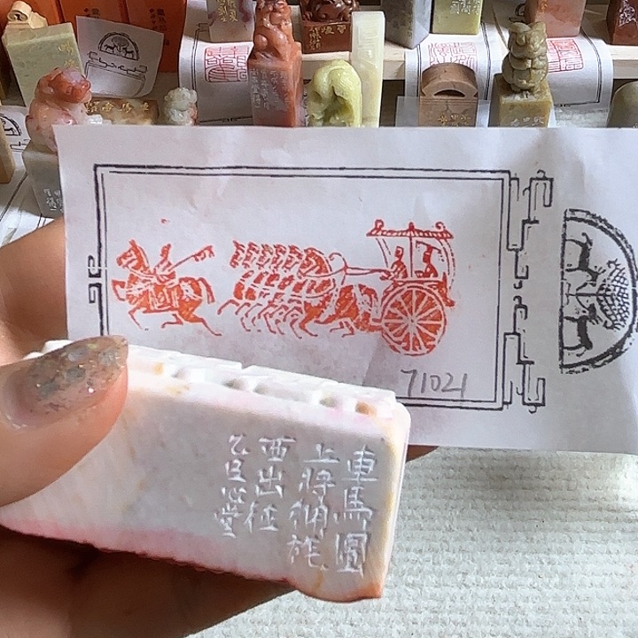 老挝石印石车马图021