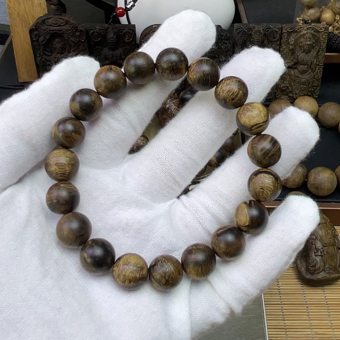 你***的手串沉香达拉干………………