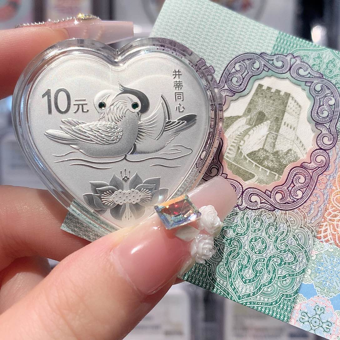 纯银2017年并蒂30克原盒证银币