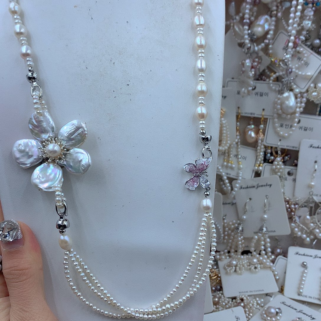 猪***。银S925镶嵌耳饰淡水珍珠