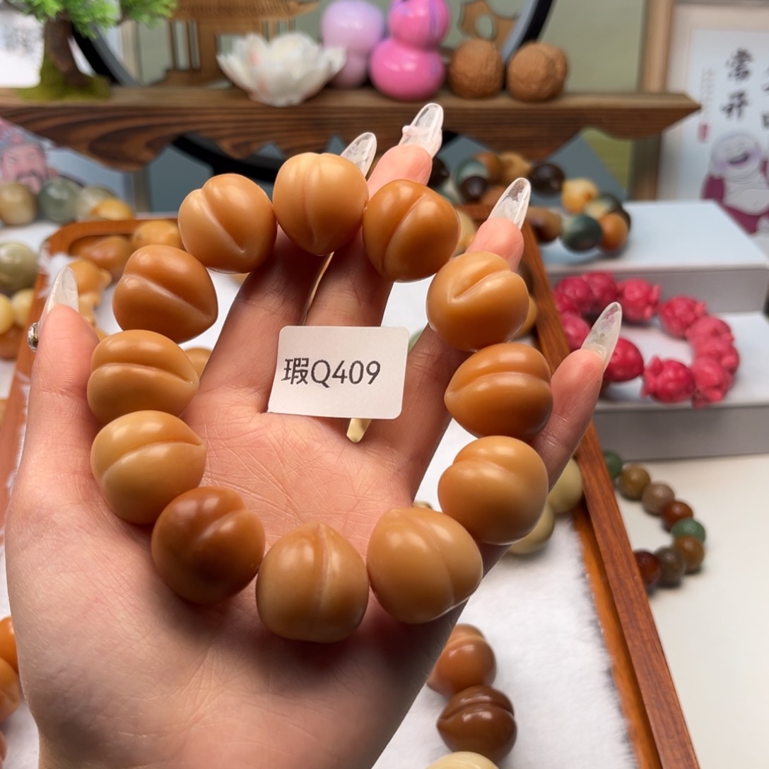 菩提根/象牙果手串明*21mm瑕桃子一串q409
