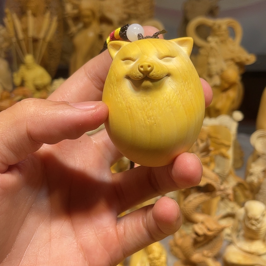 黄杨木瑕疵狗蛋把件