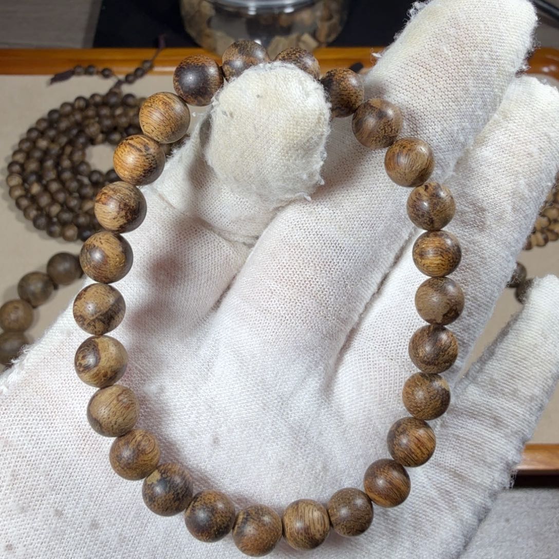 沉香碎屑沉香菩萨棋95分沉5.1克0.7