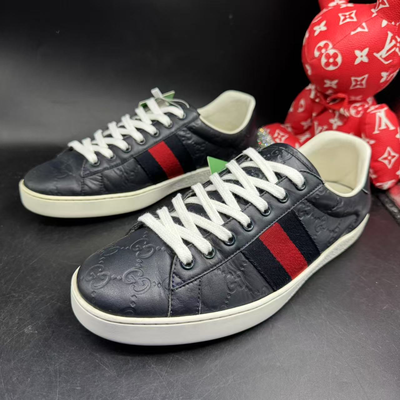 95新 GUCCI/古驰 【AO福利】40欧码 男士休闲深灰压印织带板鞋ao531