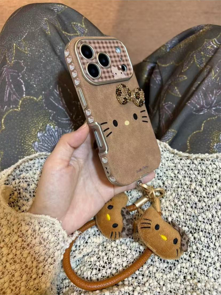 卡通皮纹棕色蝴蝶结kt猫适用iPhone17pro手机壳苹果16pro手绳15新