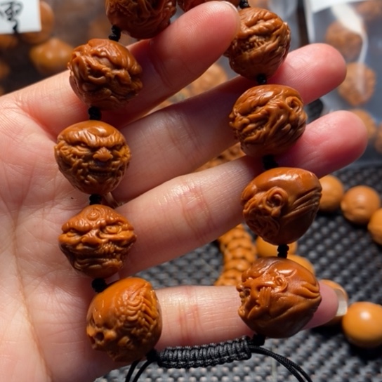 橄榄核吊坠向死而生