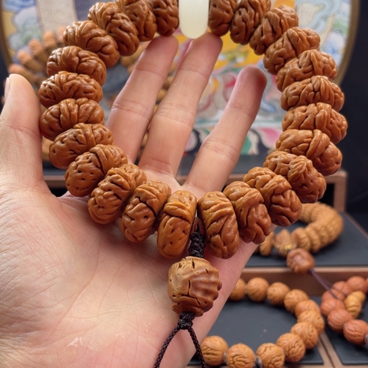 桃核手串炳****化龙纹桃核白玉龙