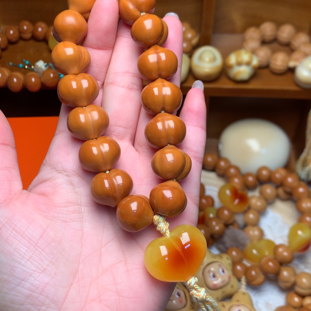 猴头核桃把件17玻璃底屁桃手持爱心