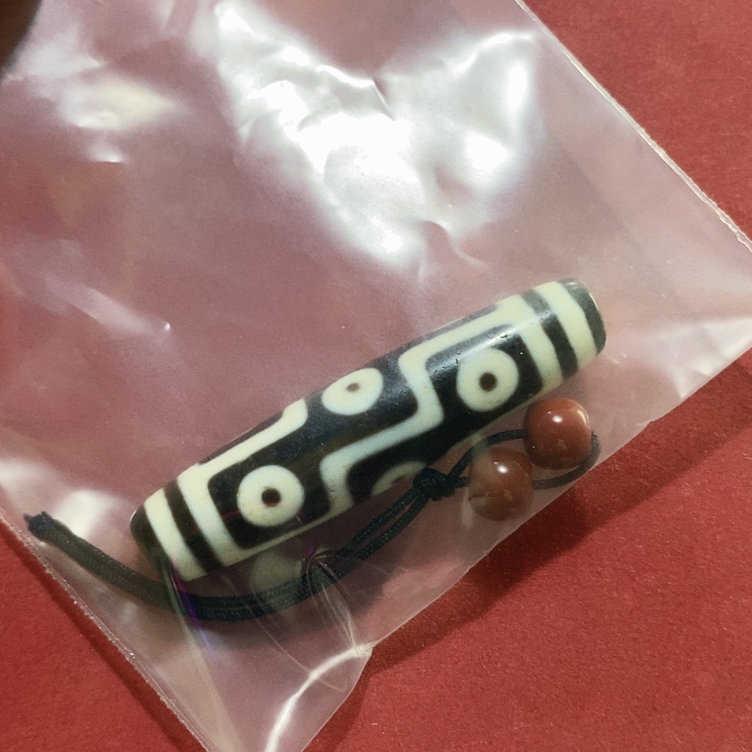 贺***…玛瑙/玉髓（覆膜）未镶嵌颈饰行运九眼