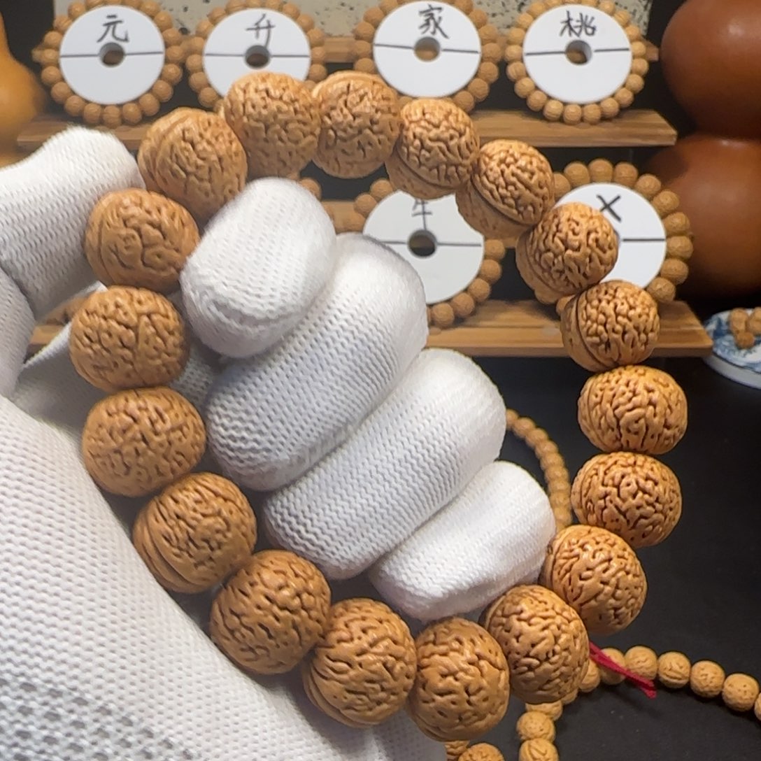 祉**茂蚂蚁桃核手串天花板